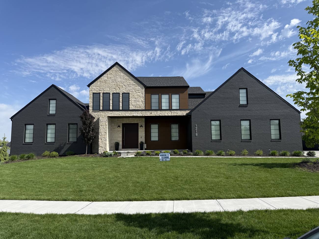 Residential window cleaning on a Lincoln home